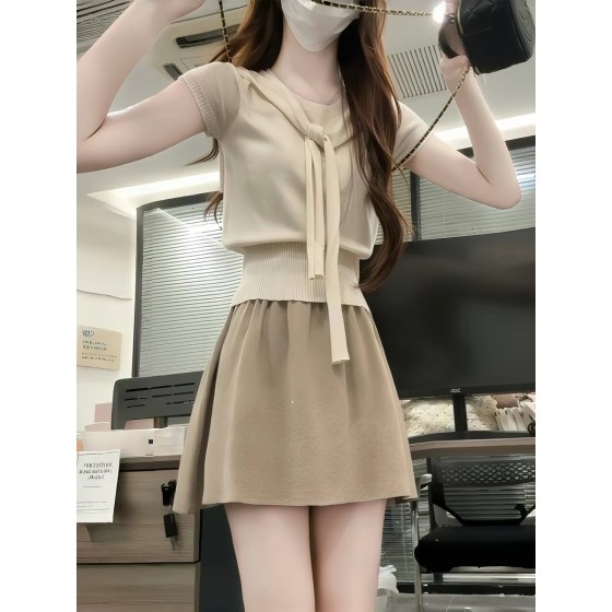 Unique and beautiful two-piece summer set featuring a shawl-style top and a fitted waist; a stunning new style for women in 2026.